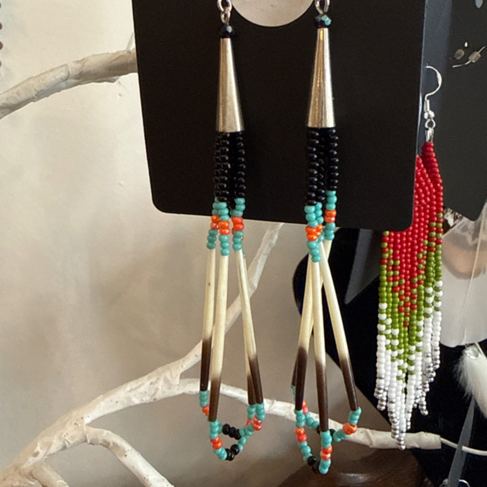 019-long quill earrings