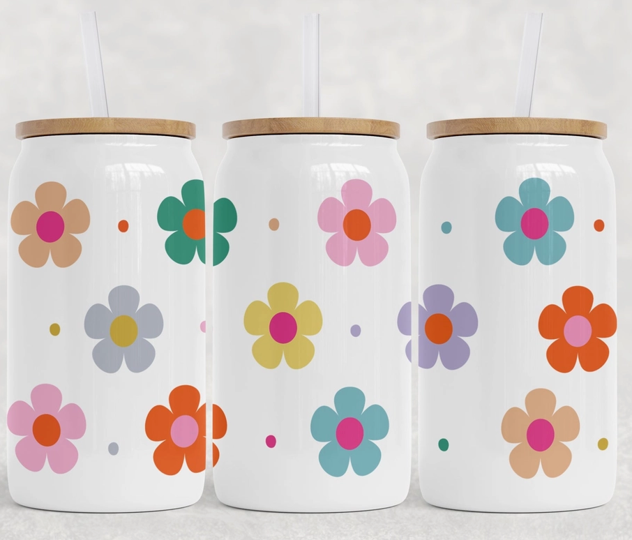 colourful daisies can glass