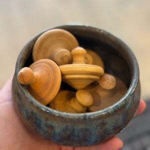 wooden spinning tops clay house farms