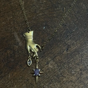 hand and star necklace