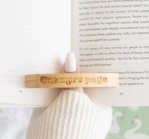 one more page thumb page holder
